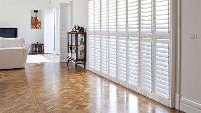 Plantation shutters in lounge room